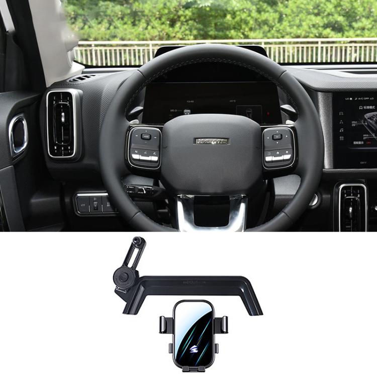 Black car phone holder mount with extension arm and cradle near steering wheel