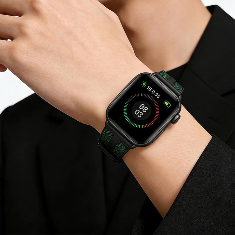 Close-up of a green-accented hybrid nylon and silicone watch band on a wrist