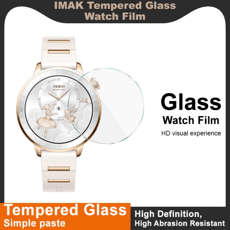 Clear round watch screen protector beside a gold-tone smartwatch