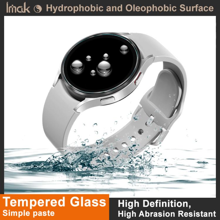 Smartwatch with a glossy round screen and water droplets on its band