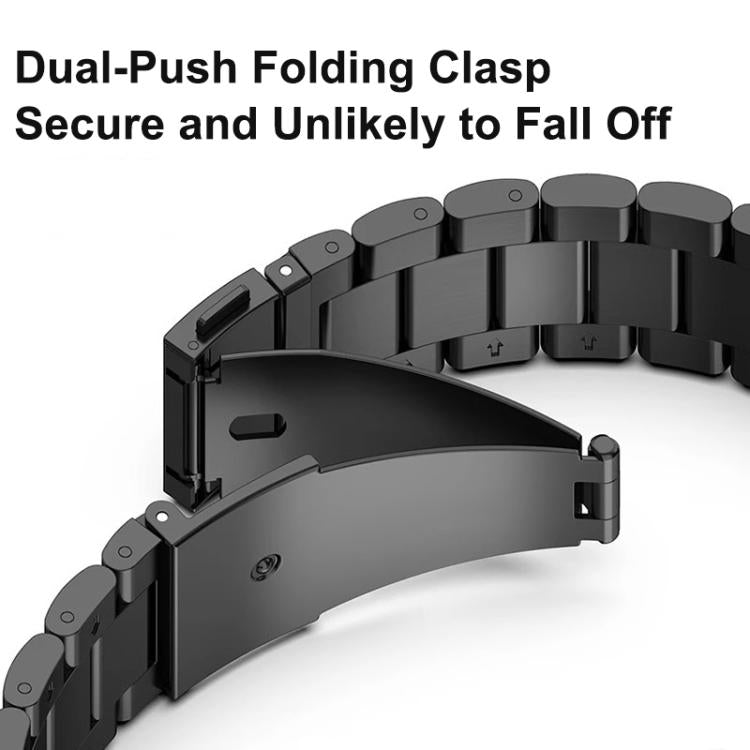 Close-up of black watch band dual-push folding clasp
