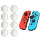 Set of eight white joystick thumb grip caps for game controllers