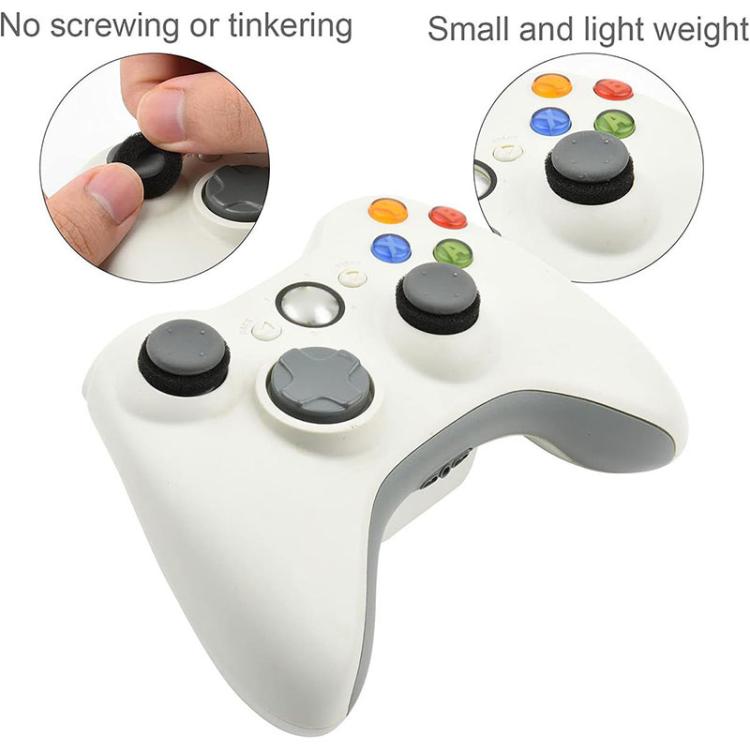 Joystick damping rings set on controller thumbsticks with extra ring pieces