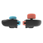 Installed silicone thumbstick caps with textured grips on black controllers