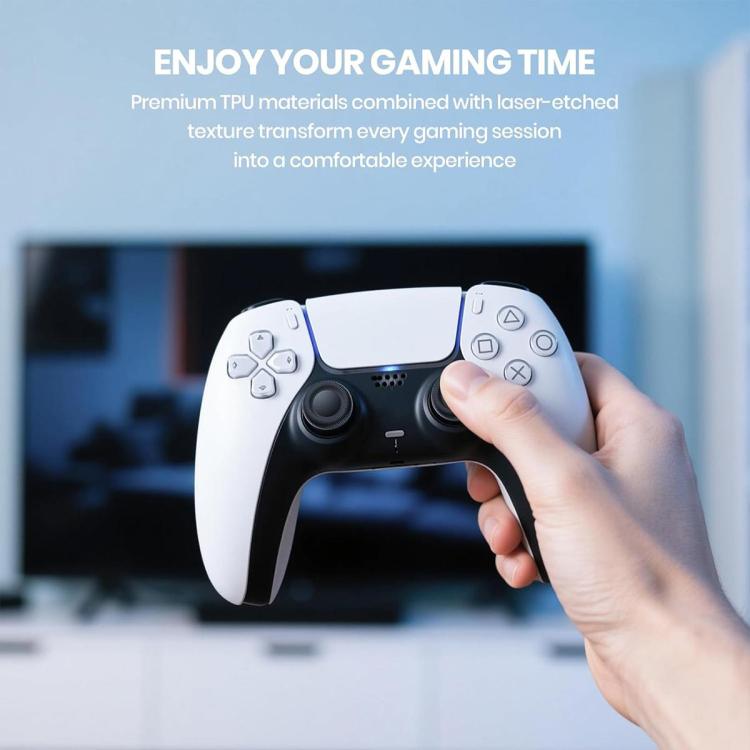 Black joystick thumb grip cap installed on white game controller analog stick.