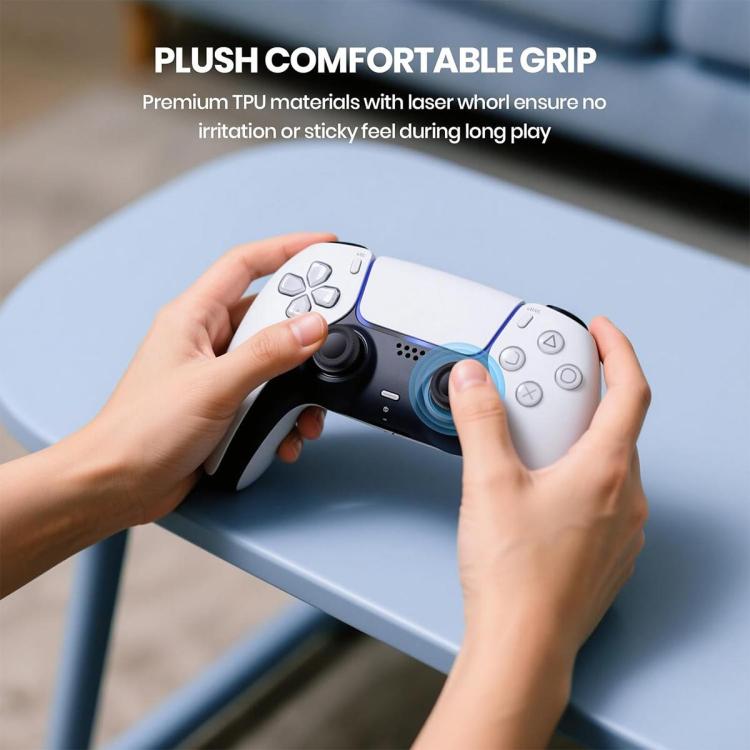 Black joystick thumb grip caps installed on a white game controller analog sticks.