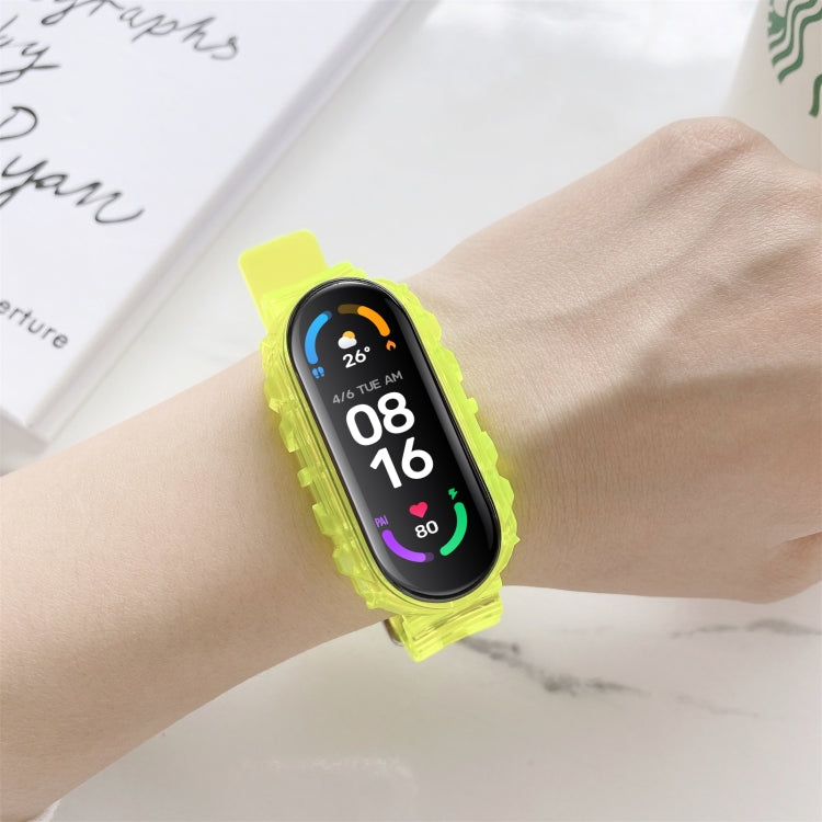Bright yellow silicone replacement watch strap with smartwatch display on wrist