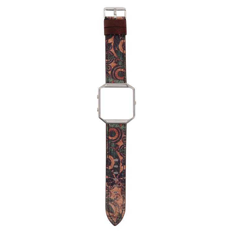 Leather watch strap with dark floral pattern and silver buckle clasp