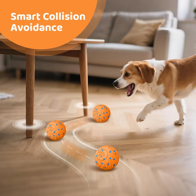 Orange smart pet toy ball with blue paw pattern near a dog on the floor