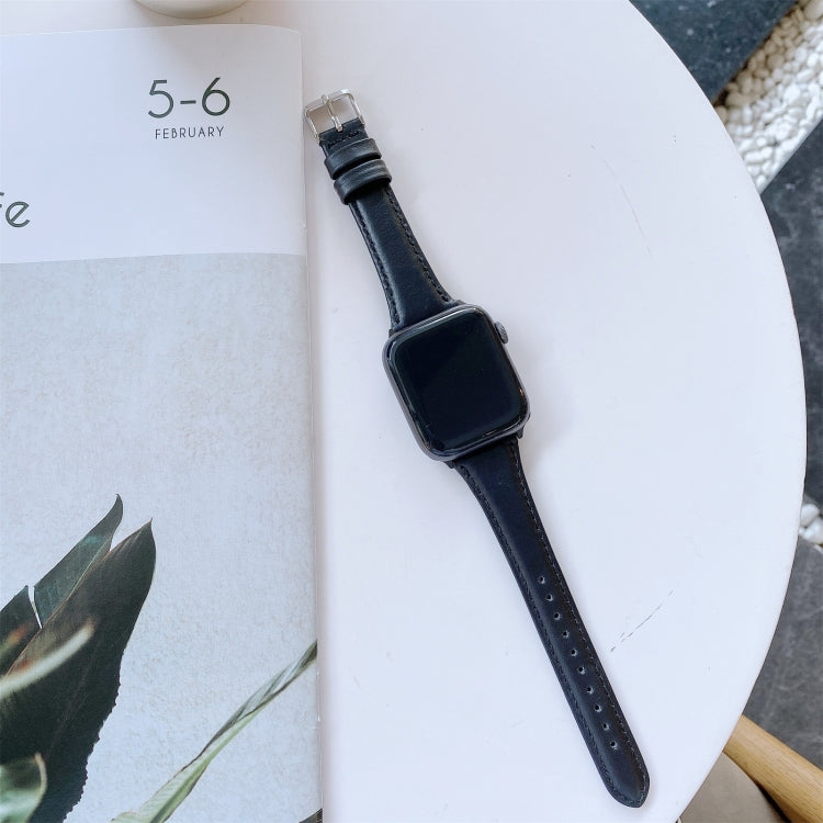 Double-sided genuine leather watch strap with metal buckle, black, perforated holes.