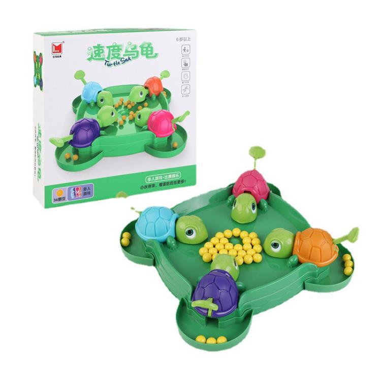 Turtle bean-eating game set with green tray, colorful turtles, and retail box