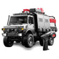 Silver and gray six-wheel all-terrain RC truck with roof details and chunky tires.