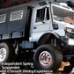 White and gray six-wheel RC truck side view with spring suspension and chrome wheels.