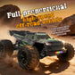 Black off-road RC monster truck with green stripes, front LEDs, and suspension details