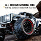 Grey 1:14 remote control off-road car side view with chunky tires and red coil suspension.