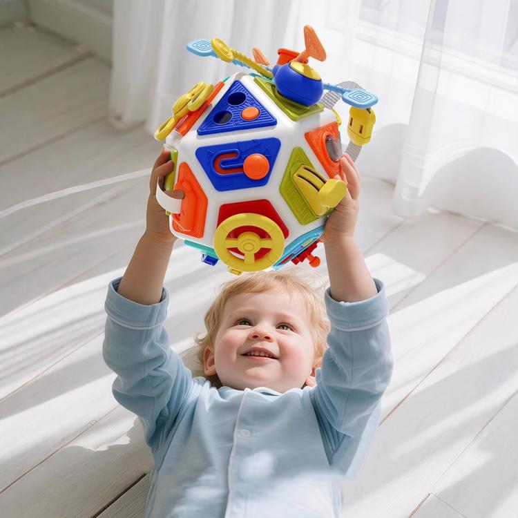 Blue and white activity cube toy with colorful switches, buttons, and side handles