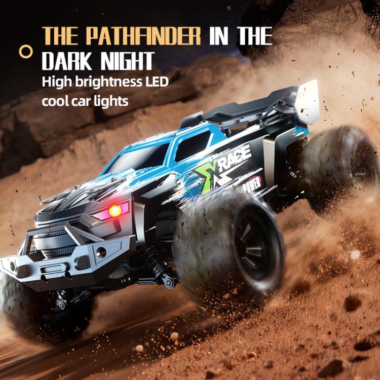 Blue remote control off-road truck driving with bright LED lights