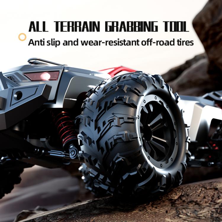 Red remote control off-road truck close-up of all-terrain tires and bumper