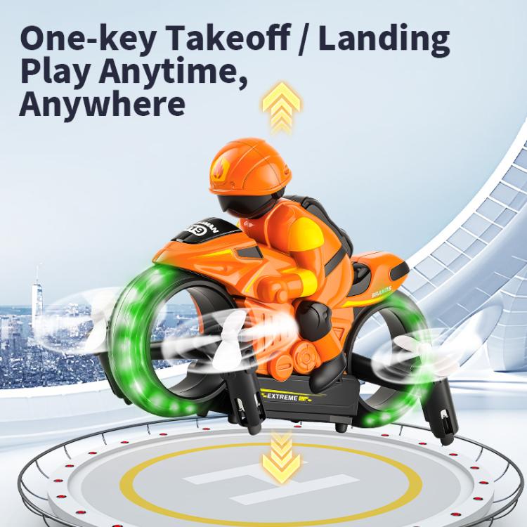 Orange/black RC amphibious flying motorcycle with green ring lights and white propellers