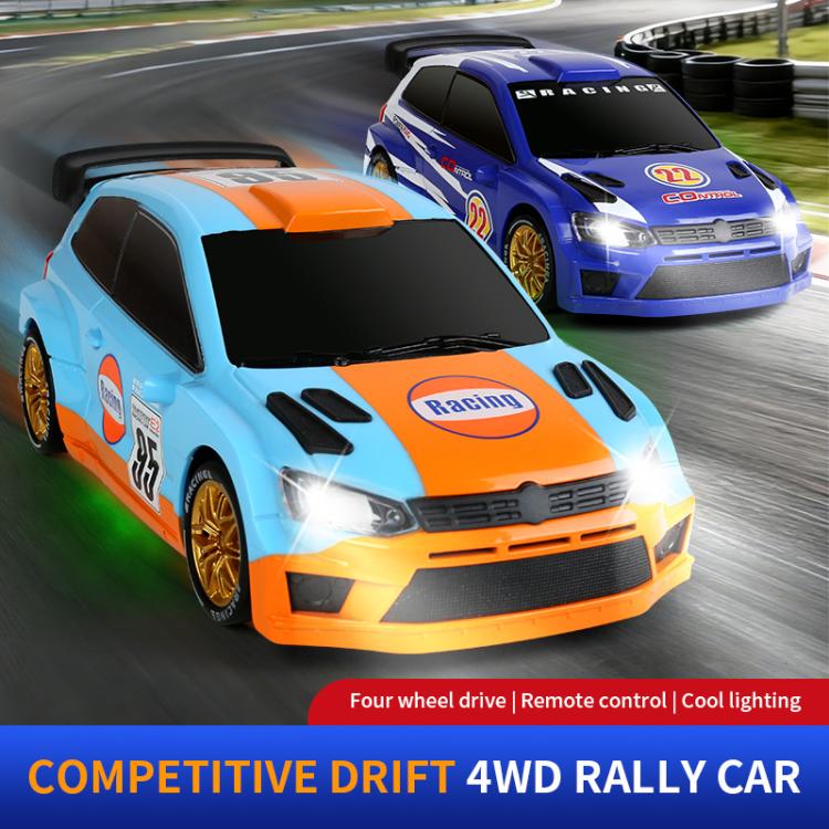 Light-blue and orange RC drift rally car with gold wheels on a race track