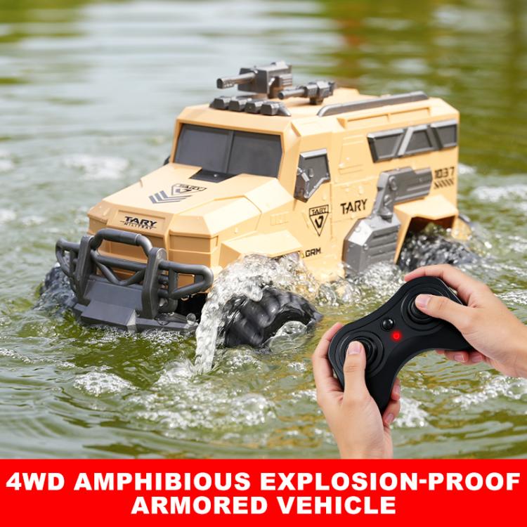 Tan remote-control amphibious armored vehicle splashing in water with handheld remote