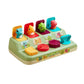 Pop-up animal learning toy with colorful dinosaur figures in square and round pop-up slots