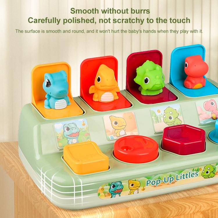 Mint pop-up learning toy with four dinosaur figures in colored bases and smooth rounded buttons
