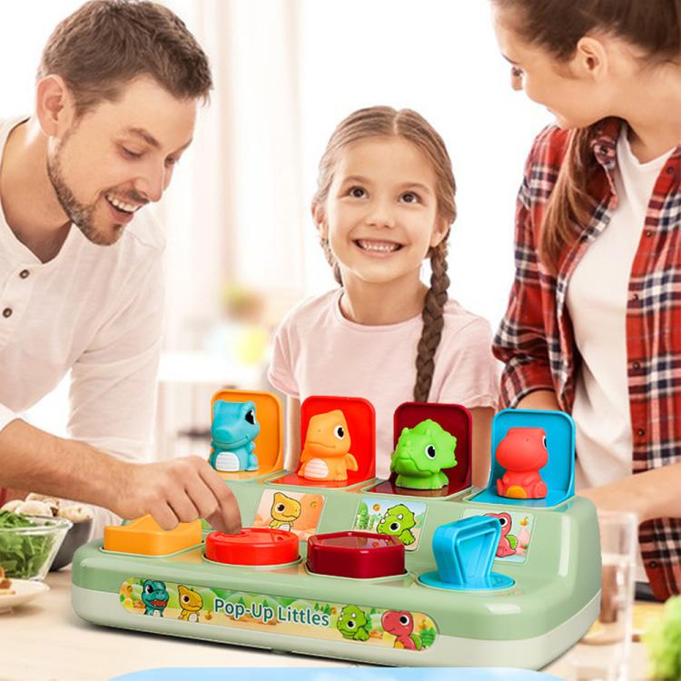 Pop-up animal learning toy with dinosaurs in colored slots on a mint base for children