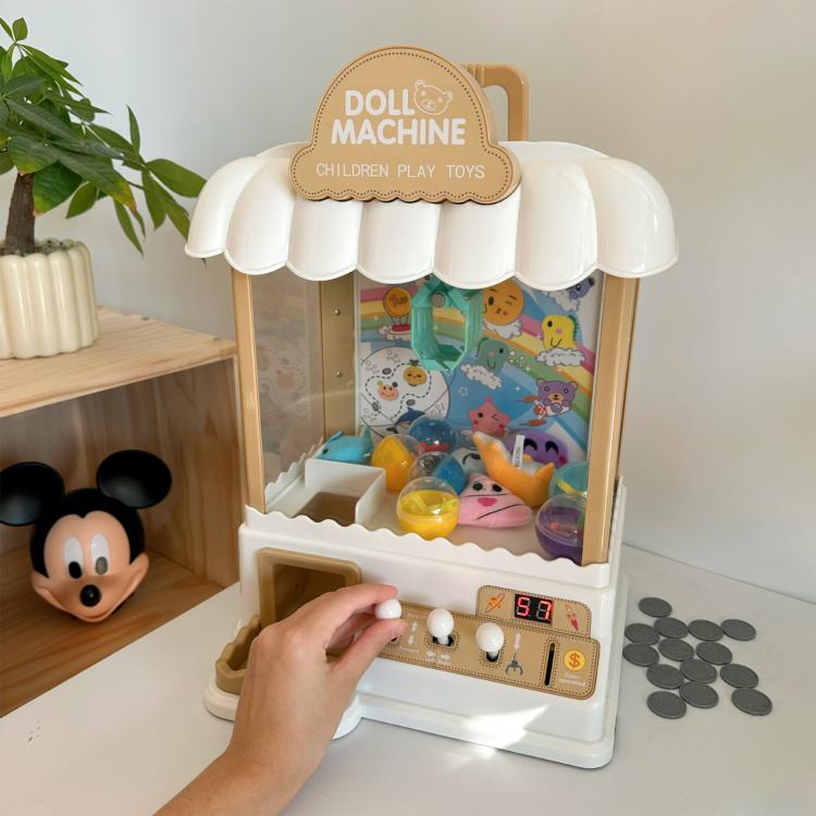 Children's mini claw game machine toy with hand pressing the control buttons