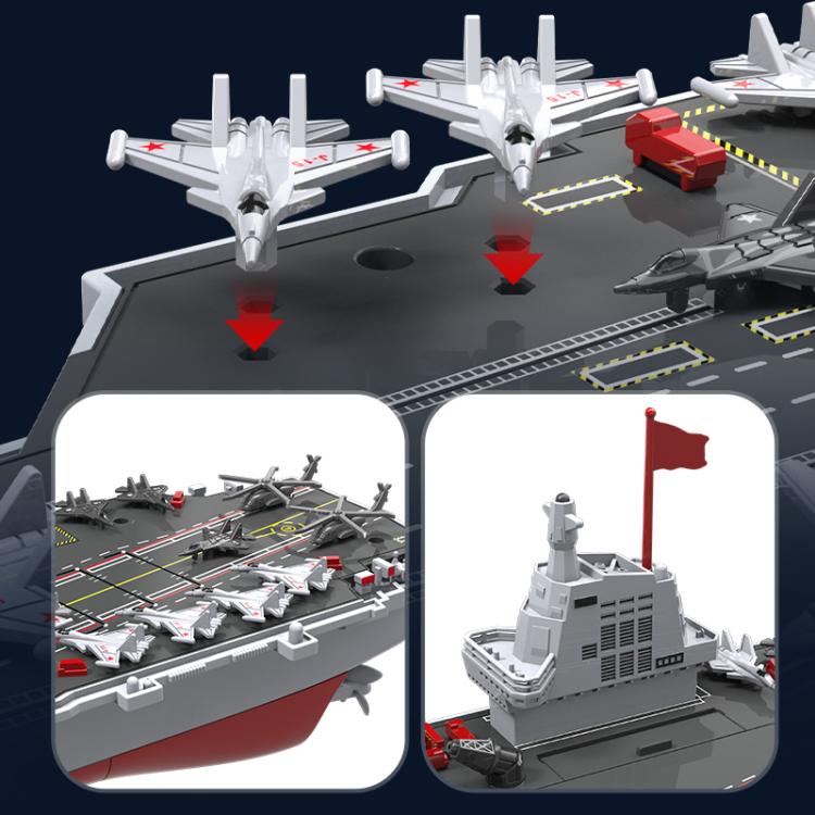 Remote-controlled aircraft carrier toy shown with jets on deck and gray command tower.