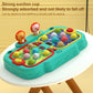Teal whack-a-mole toy with suction cup base and raised animal play panel
