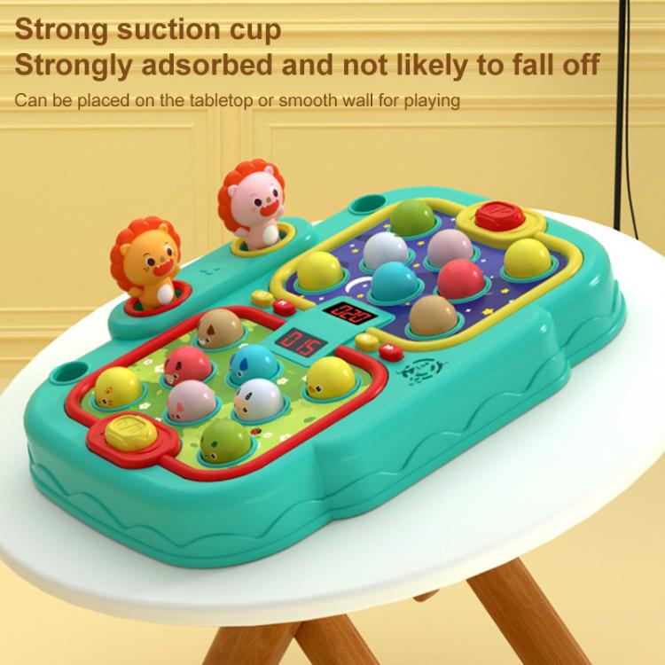 Teal whack-a-mole toy with suction cup base and raised animal play panel