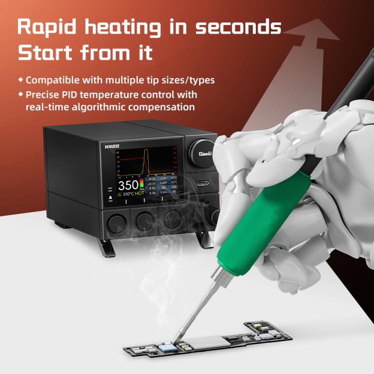 Black soldering station with green soldering iron tip held above PCB