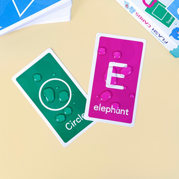 Colorful letter flash cards featuring E and elephant, plus shape cards like circle