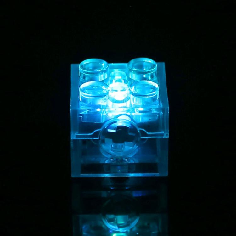 Transparent LED building-block cube glowing ice blue