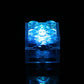 Translucent LED building-block cube glowing bright blue
