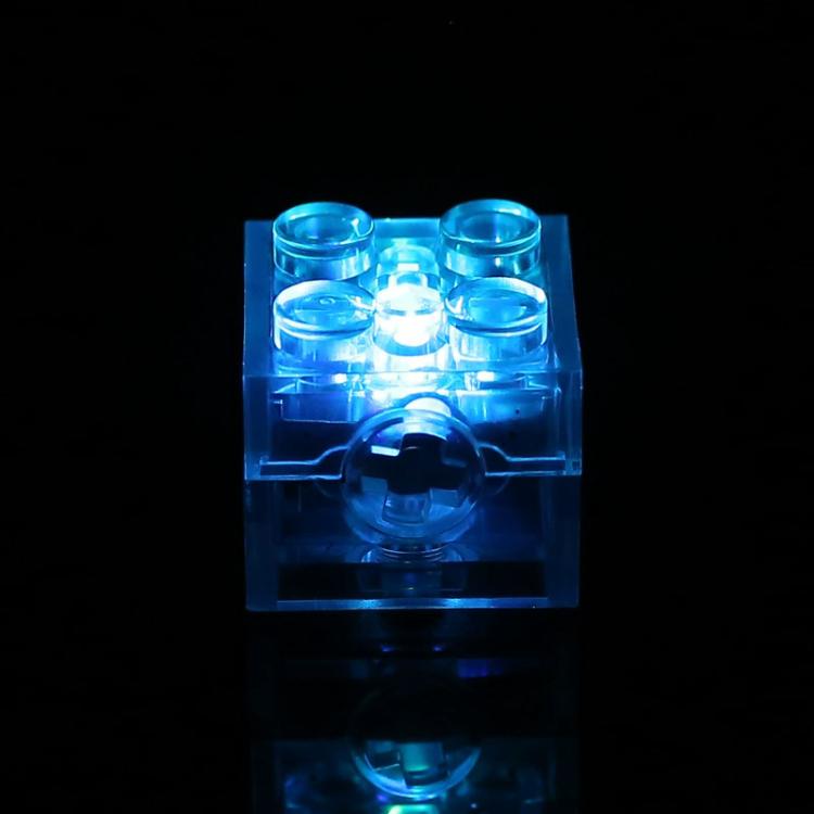 Translucent LED building-block cube glowing bright blue