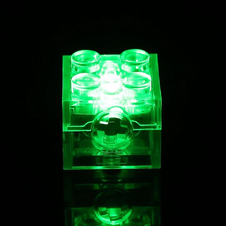 Translucent LED building-block cube glowing vivid green