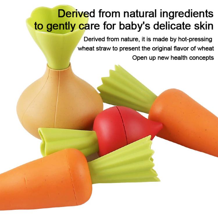 Vegetable pretend-play toy pieces: carrot, radish, and lettuce shapes with green tops