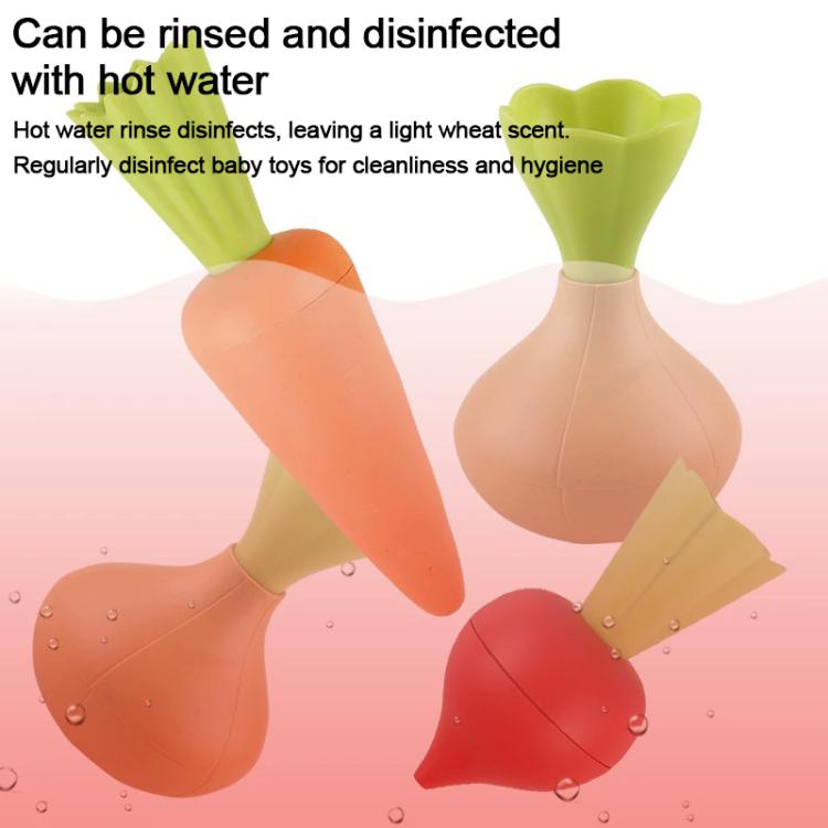 Vegetable toy pieces with water droplets and green tops, orange carrots and red radishes