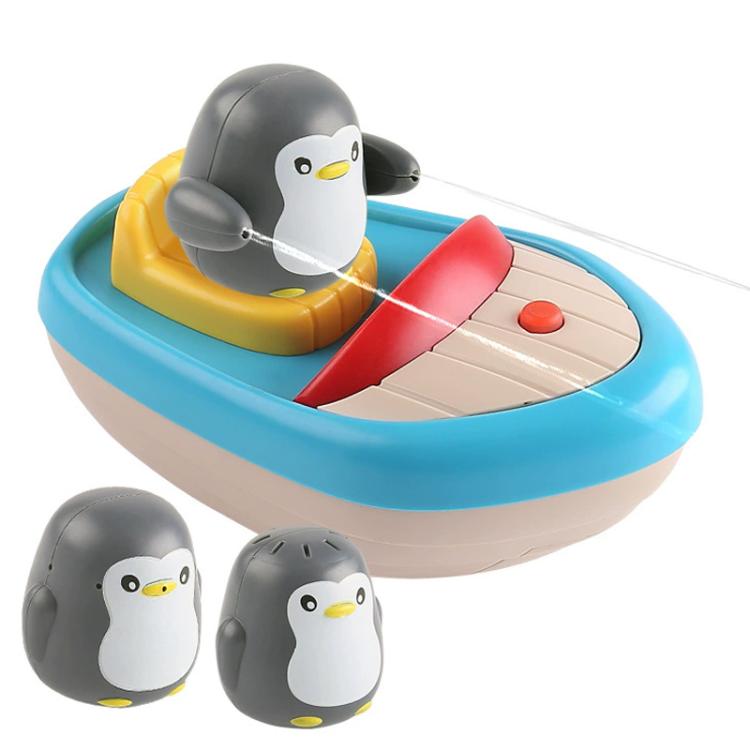 Children's penguin boat bath toy with blue base, red sprayer, and three penguin figures