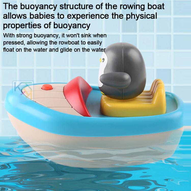 Penguin boat bath toy floating on water with red sprayer and grey penguin figure