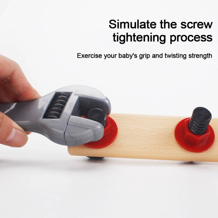 Gray plastic screw-tightening tool on wooden base with red pegs; pretend play