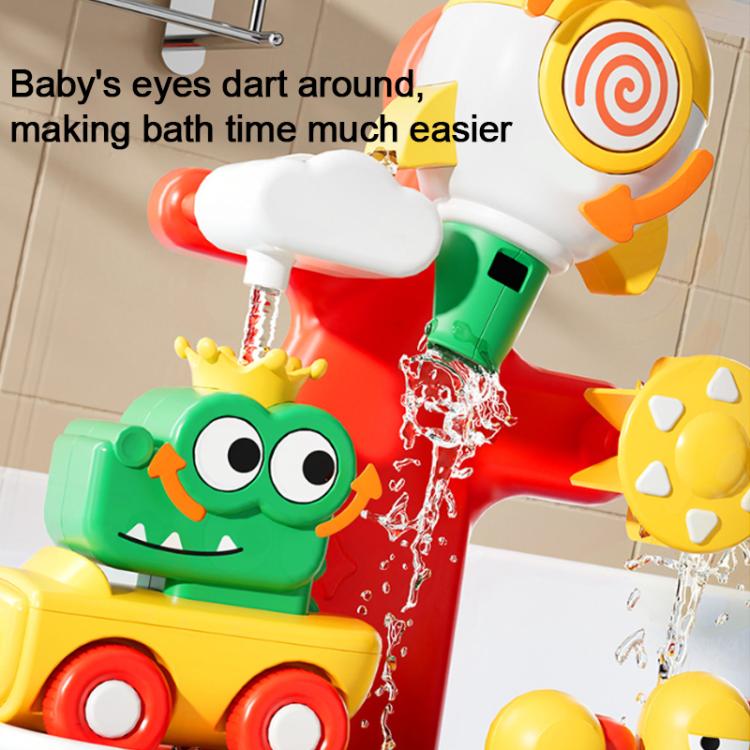 Close-up of shower duck toy sprayer head with water stream and duck, frog, star figures