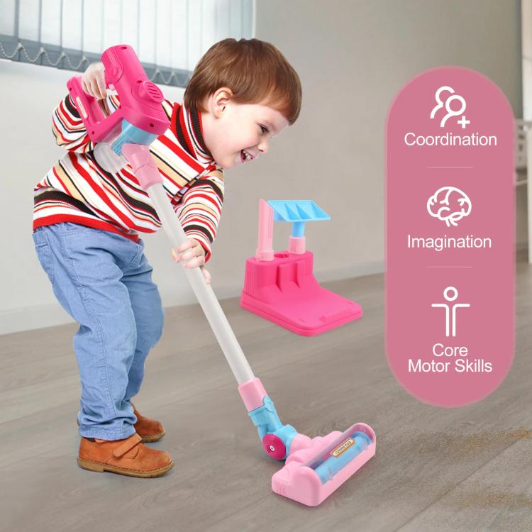 Children’s pretend vacuum cleaner set with pink base, wand, and blue nozzle attachment