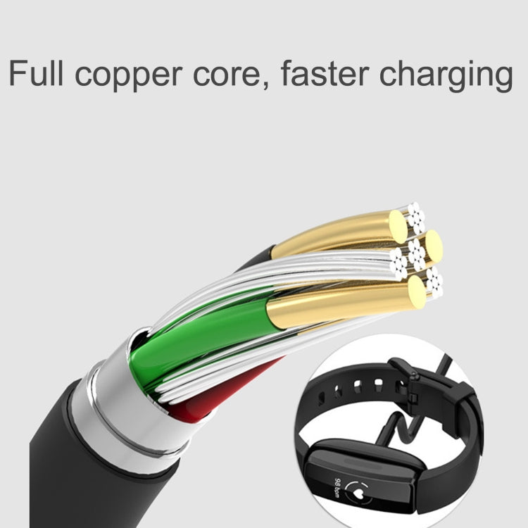 Black charging cradle with visible internal multi-strand wire bundle for faster charging