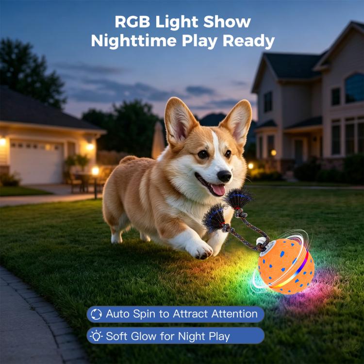 Orange RGB lit dog toy ball with glowing light and rope brush arms outdoors at night.