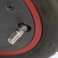 Close-up of scooter wheel air valve with metal threaded stem on rim