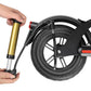 Inflation extension cable attached to scooter tire valve for pumping