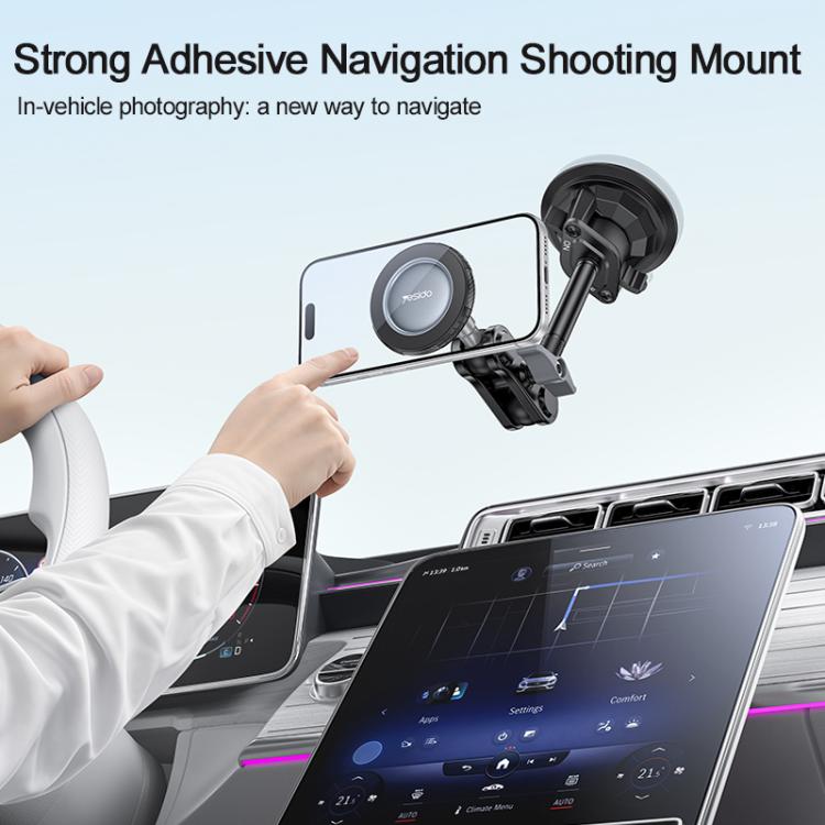 Magnetic car phone mount with clamp arm and long stem, attached to a suction cup base